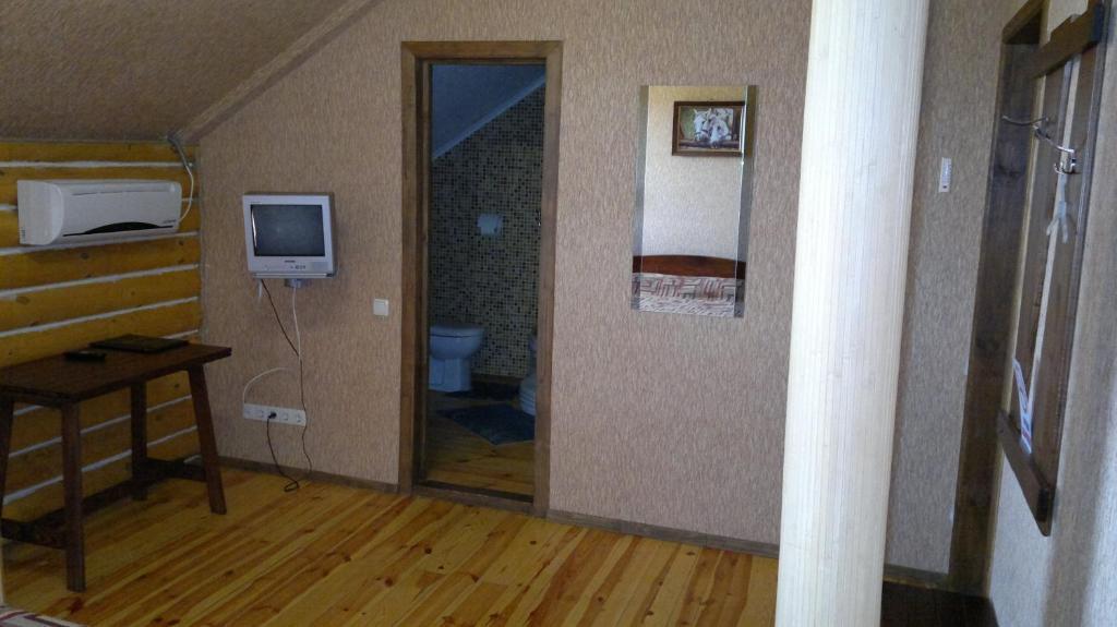 Panska Hata Hotell Nyzhnya Khortytsya Rum bild